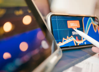 Trader across multiple markets reviewing options in Bitcoin, Ethereum and forex